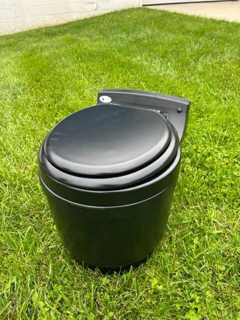 Laveo Dry Flush Portable Toilet perfect for RVs and camping, available at Cabin Depot. Waterless, chemical-free with self-sealing bags.
